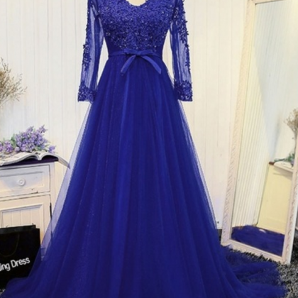 The Long, Curly Dress Of The Royal Blue..