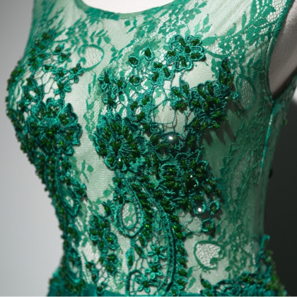 The Woman In The Long Green Lace Satin Pajama..