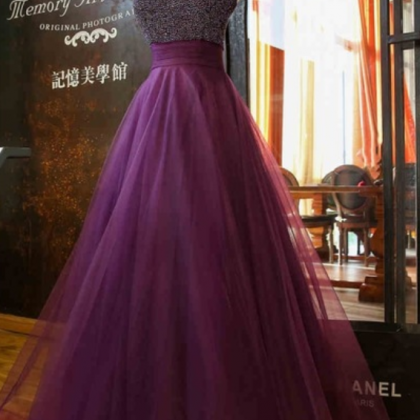 The Tulle Gown Of Violet Night Highlights The..