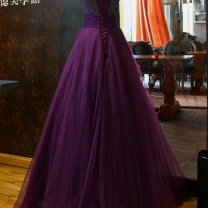 The Tulle Gown Of Violet Night Highlights The..
