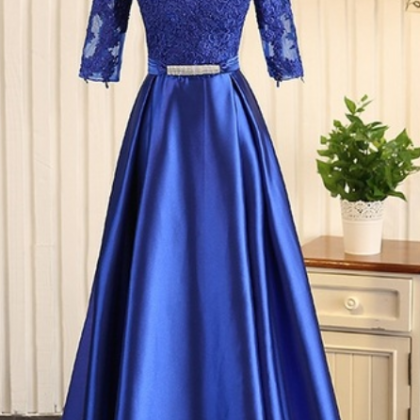 A Royal Blue Ribbon Evening Gown With A..
