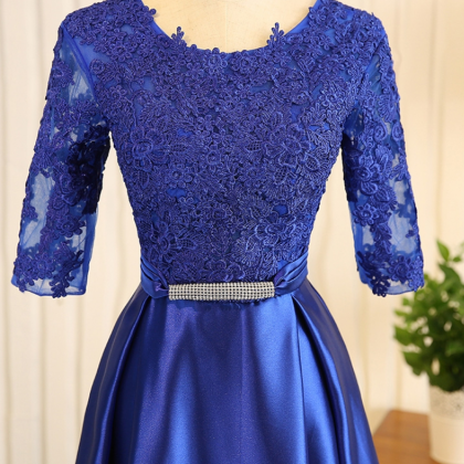 A Royal Blue Ribbon Evening Gown With A..