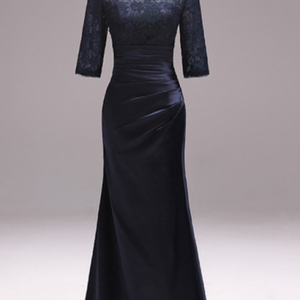 A Woman's Elegant Evening Gown Of The..