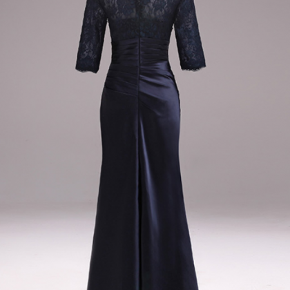 A Woman's Elegant Evening Gown Of The..