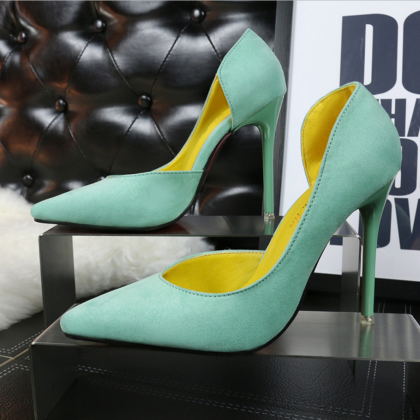 Pointed Toe Half Cut Out Suede Pump..