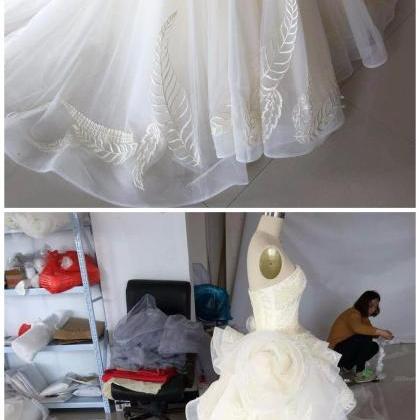 Real Photo Strapless Chapel Train Wedding Dress..