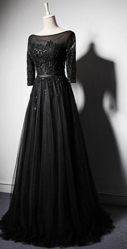 Black Long Sleeved Dress For A Woman's Wedding Bride To Begin An Elegant Formal Ball Gown