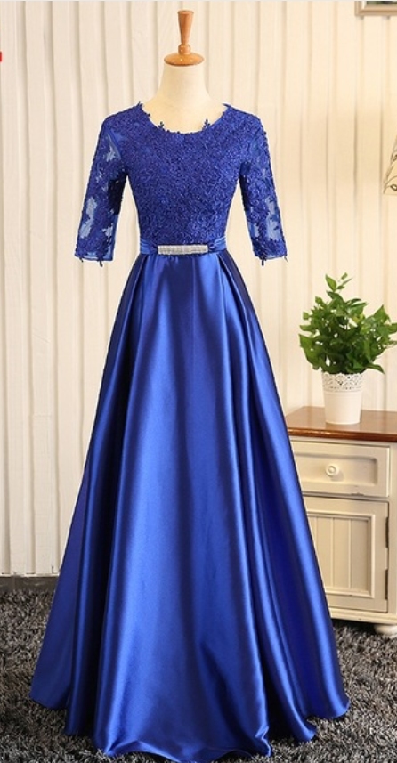 A Royal Blue Ribbon Evening Gown With A Woman's Gown Was Worn For A Formal Evening Gown
