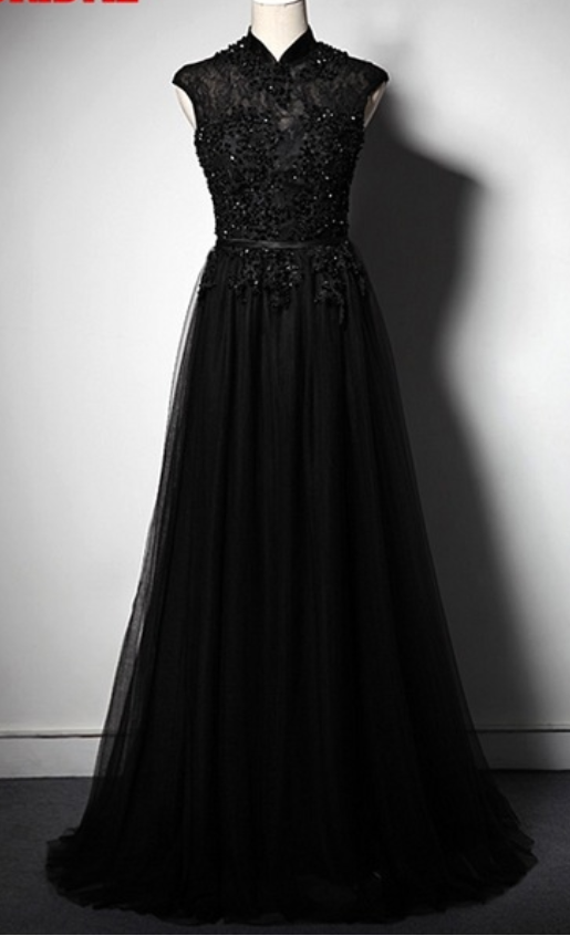 The Woman With Long Black Lace Wedding Gowns Wore A Formal Evening