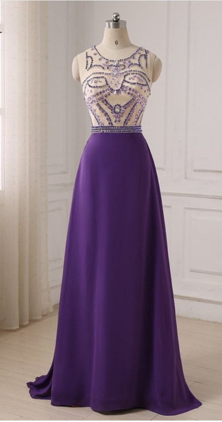 An Elegant Purple Crystal Dress With A Long Evening Gown With A Long Evening Gown