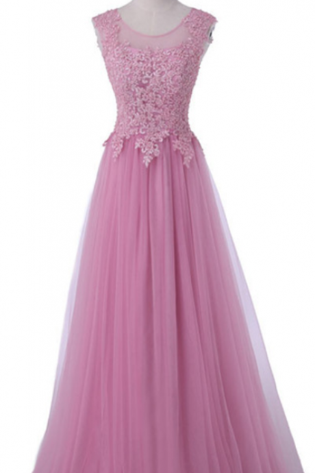 The Pink Sleeveless Ball Gown Was Worn In A Formal Evening Gown