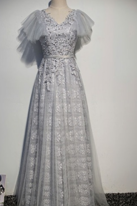 A Grey, Silvery Lace Wedding Gown With Women's Sequined Party's Formal Evening Gown In A Night Gown