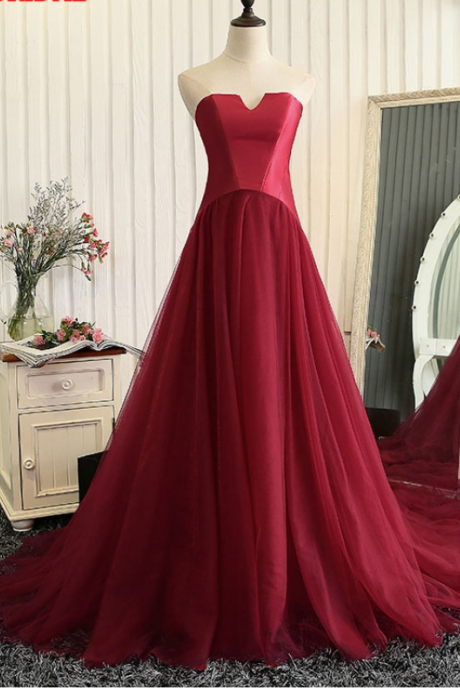 A Red Long Dress With A Simple Formal Evening Dress Is