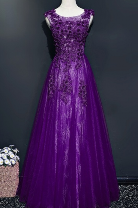 The Woman In The Purple Lace Evening Party Dress Is Wearing A Formal Evening Gown In A Night Gown