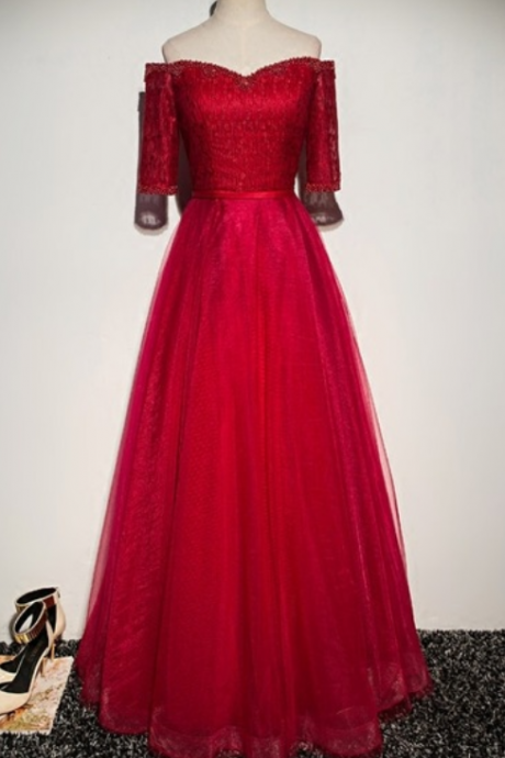 A Red Evening Dress At A Formal Dress Ball Party