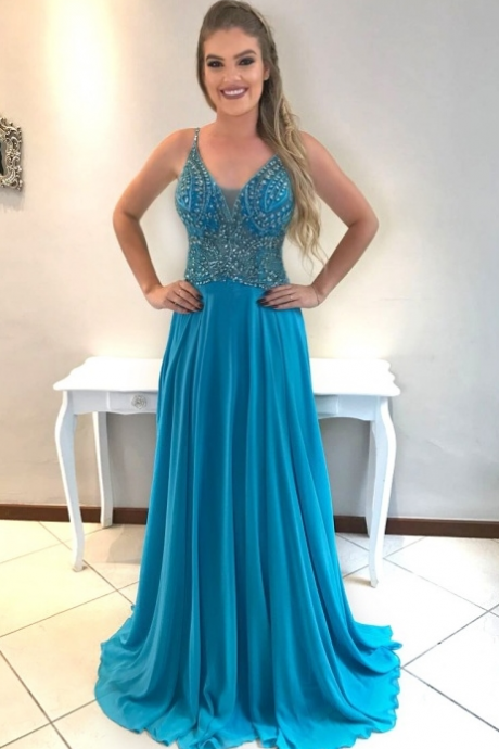 Blue Ball Gown With A Chiffon Evening Gown.