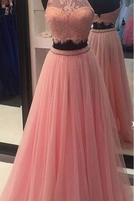 A Pink High-necked Lace Ball Gown.
